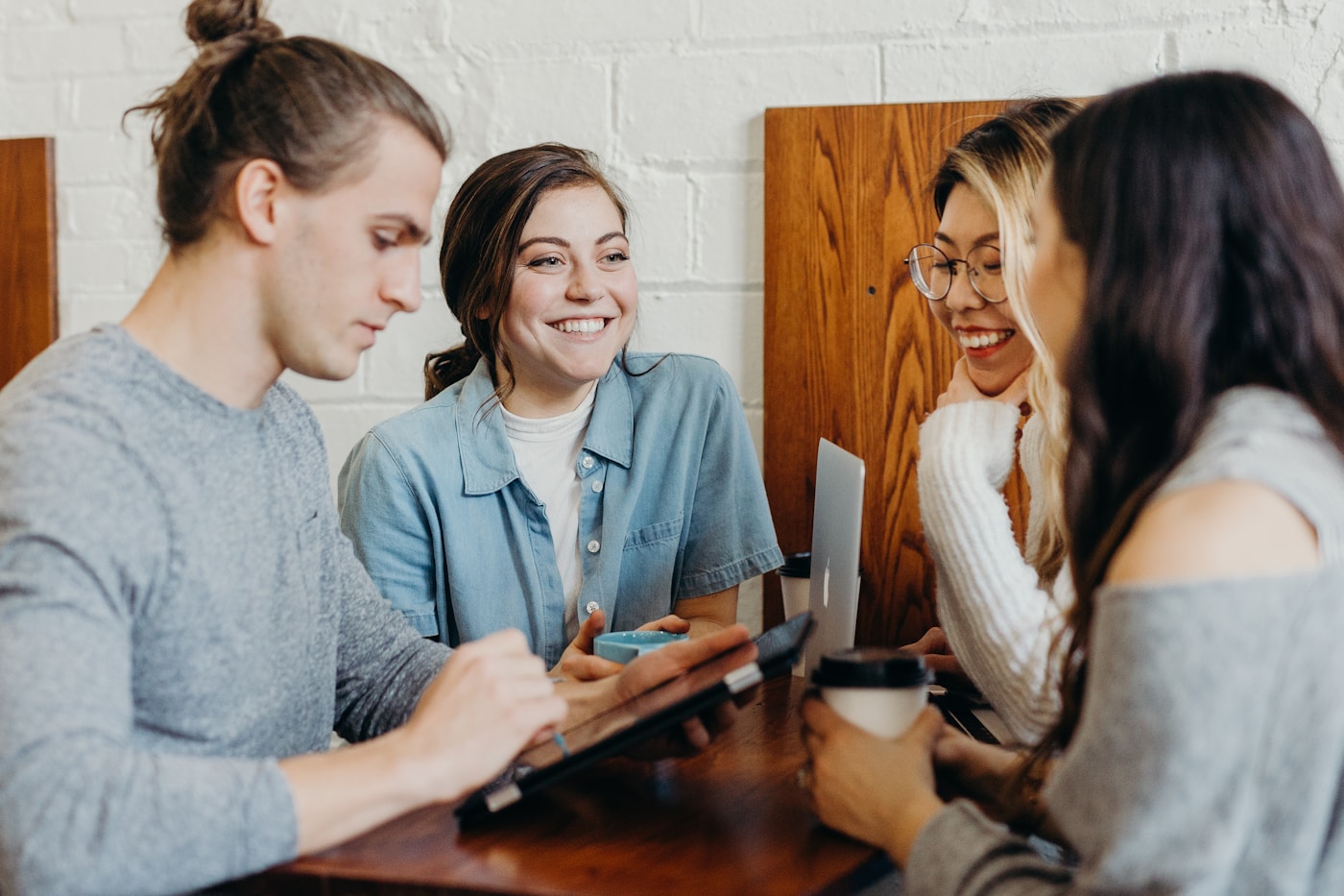 Friends talking around a table