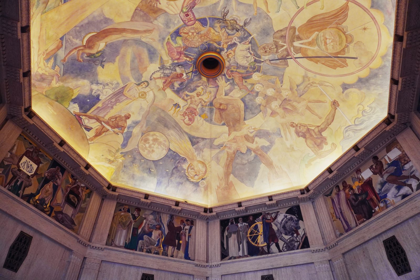Historic ceiling mural with celestial and scientific imagery