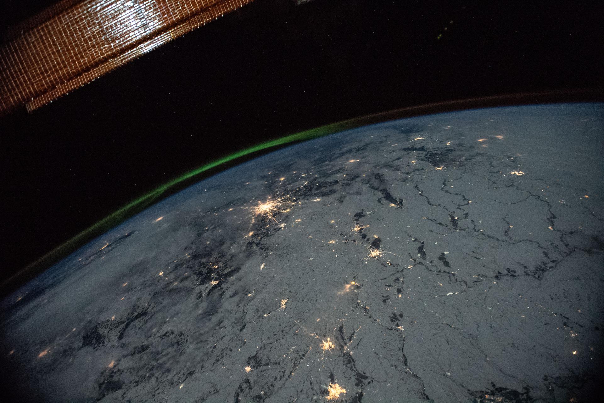 Earth’s curved horizon and aurora photographed from the International Space Station