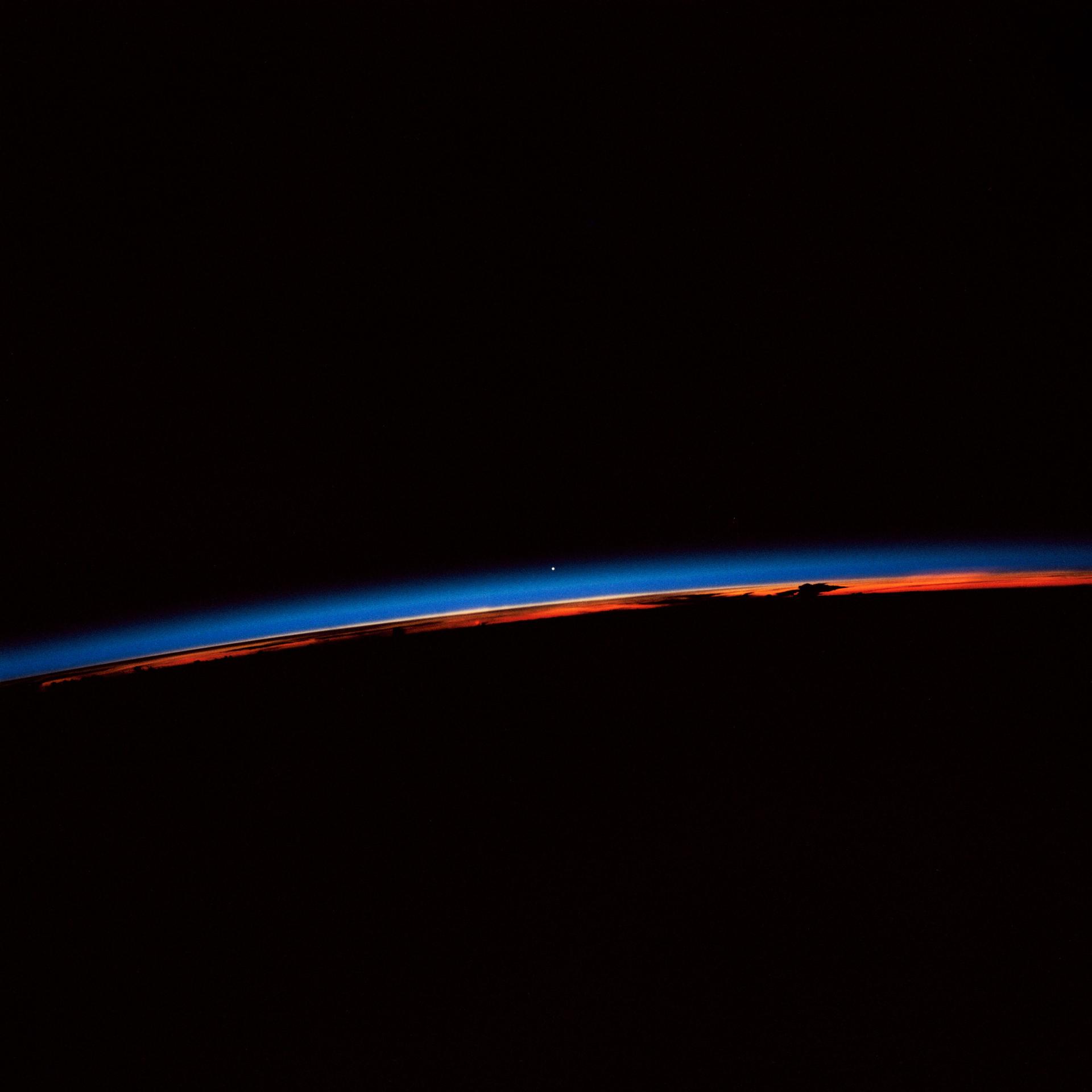 Sunset scene with Venus visible as a bright evening point of light