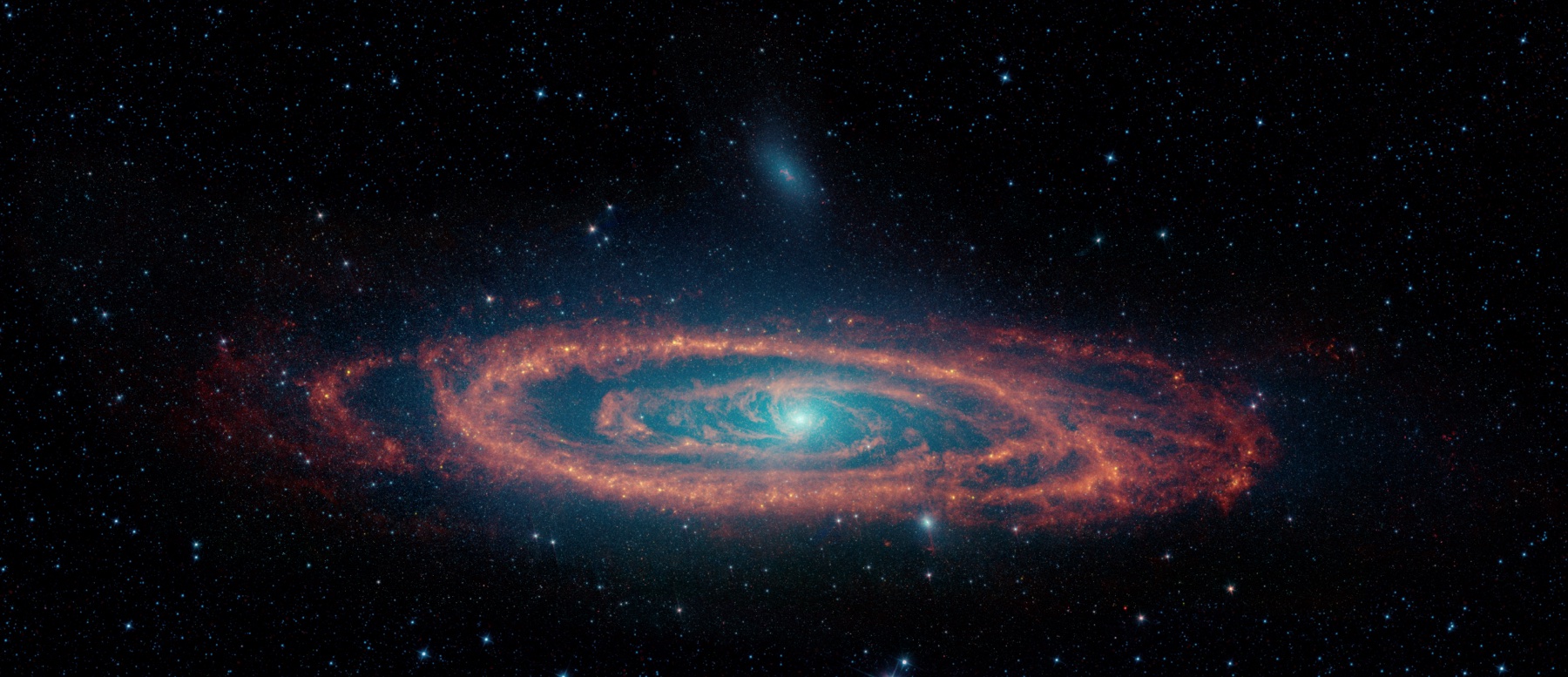 Infrared view of the Andromeda Galaxy showing stars, dust, and star-forming regions