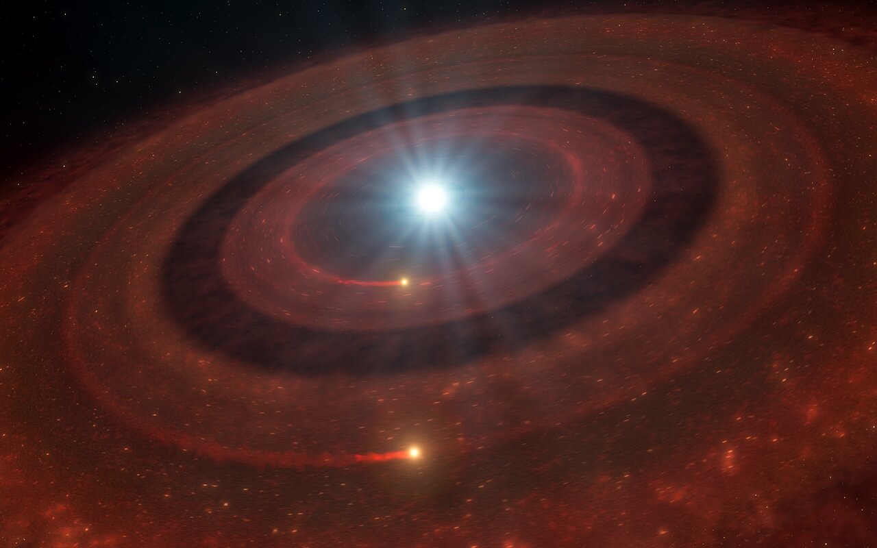 Artist’s impression of the white dwarf J1328−1450 system, emphasizing the gap between the two debris rings. Credit: ESO/L. Calçada.