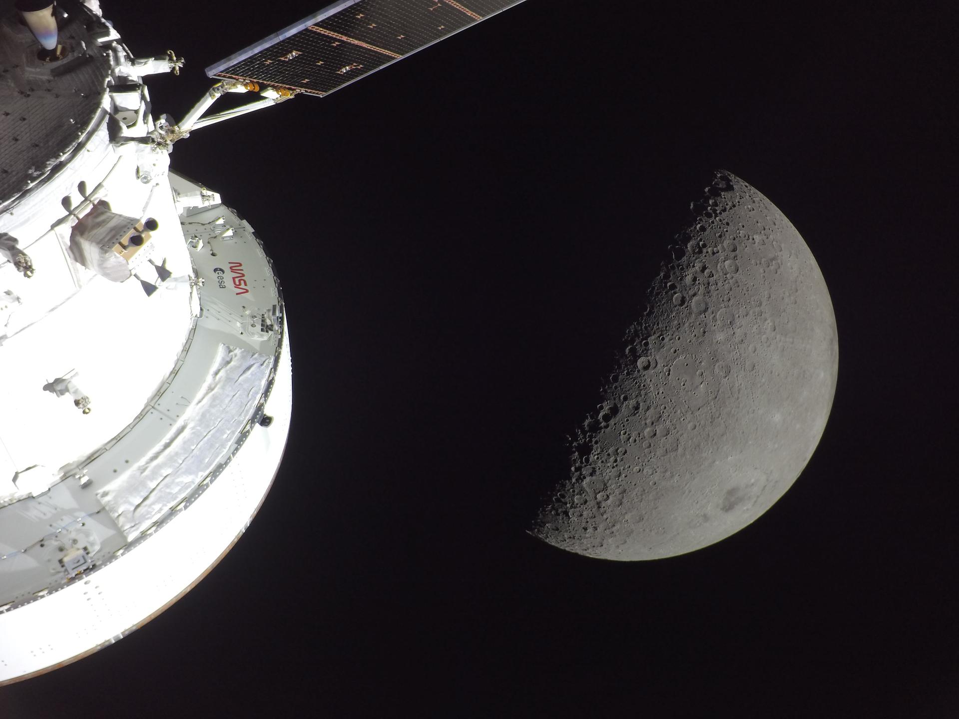 NASA Orion spacecraft illuminated by the Sun against the Moon, photographed during Artemis II. Credit: NASA.