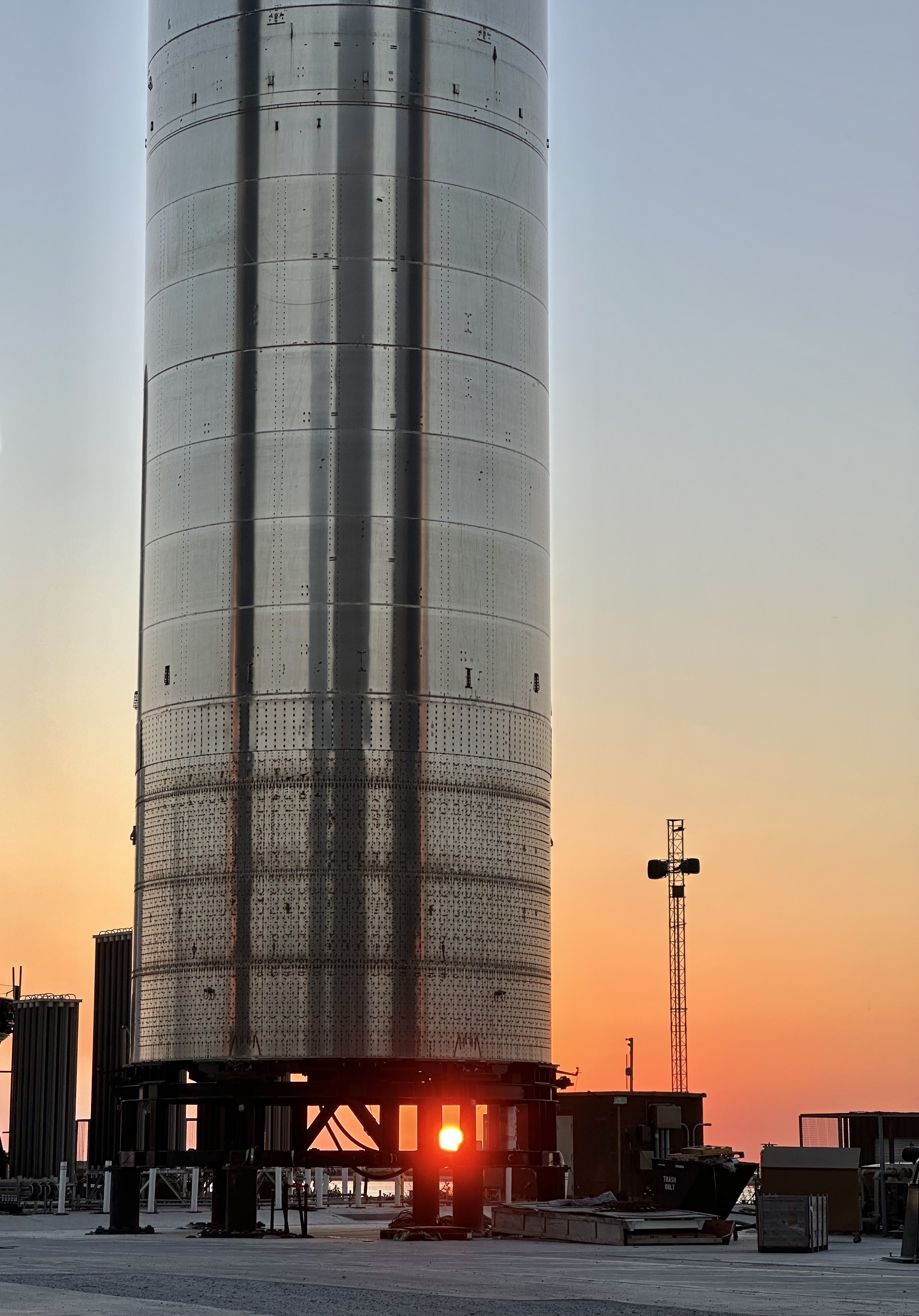 SpaceX Super Heavy booster at sunset at Starbase before return-to-flight review