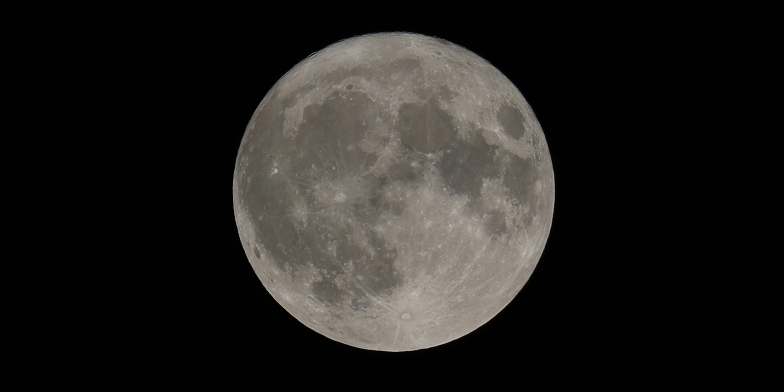 Detailed full moon against a black sky